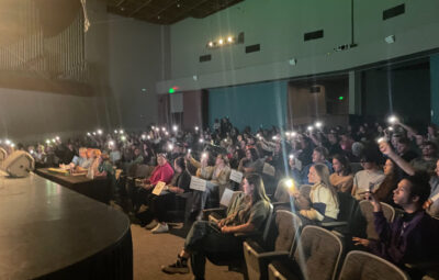 Audience shines flashlights during cover of "Beautiful Crazy" by Luke Combs.