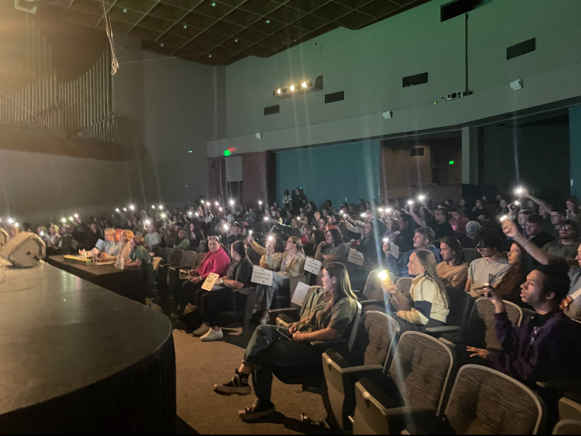 Audience shines flashlights during cover of "Beautiful Crazy" by Luke Combs.